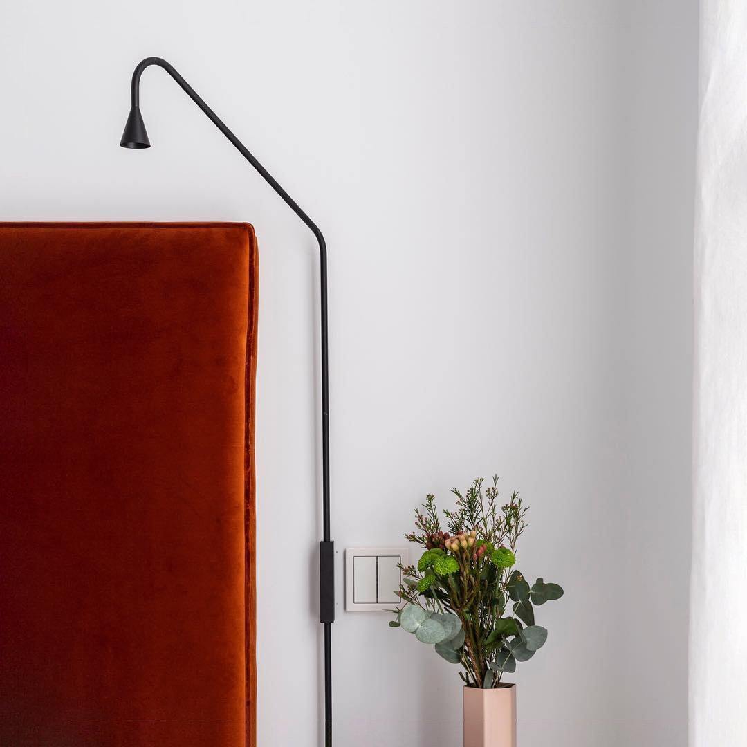 Austere wall sconce
