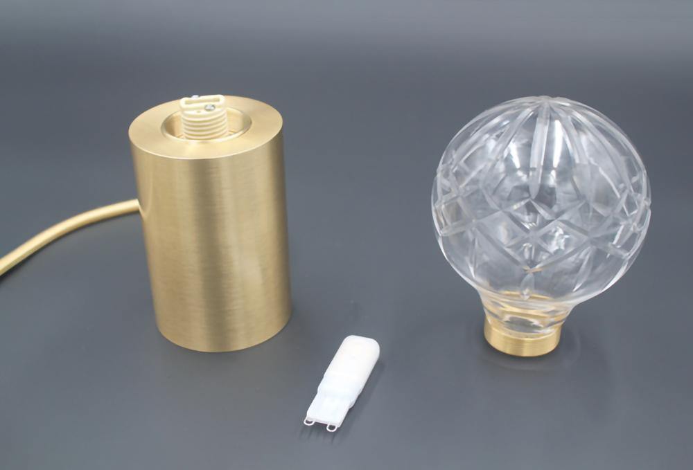 Lámpara de mesa con bombilla de cristal