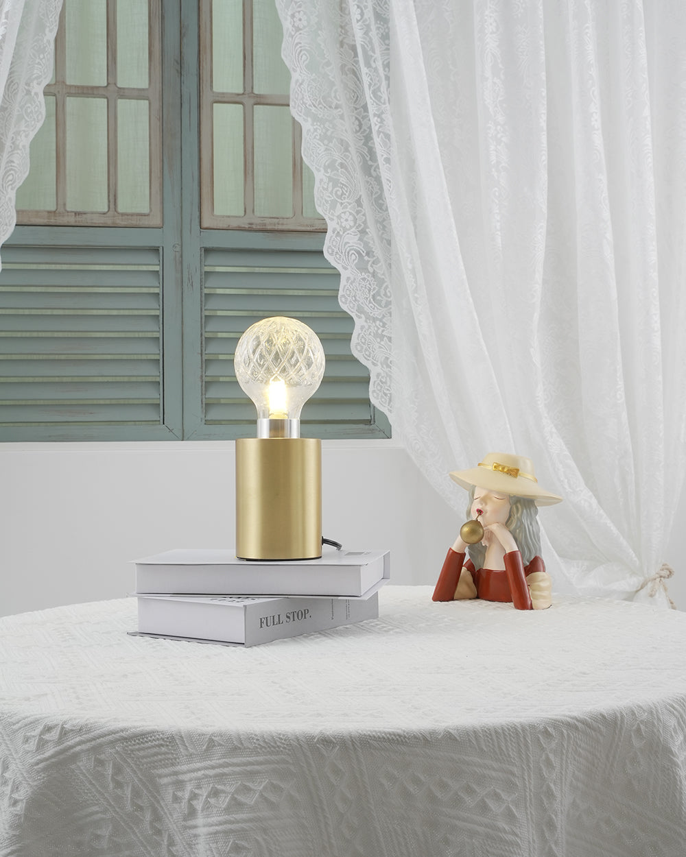 Lámpara de mesa con bombilla de cristal