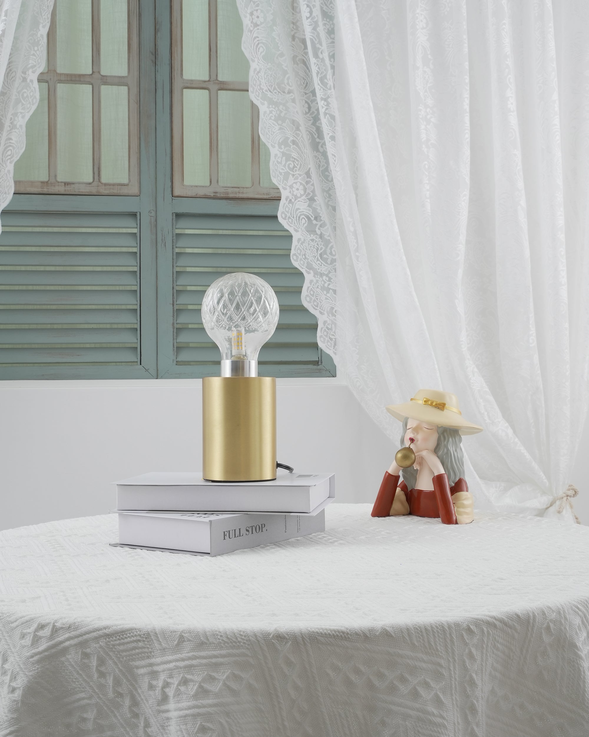 Lámpara de mesa con bombilla de cristal
