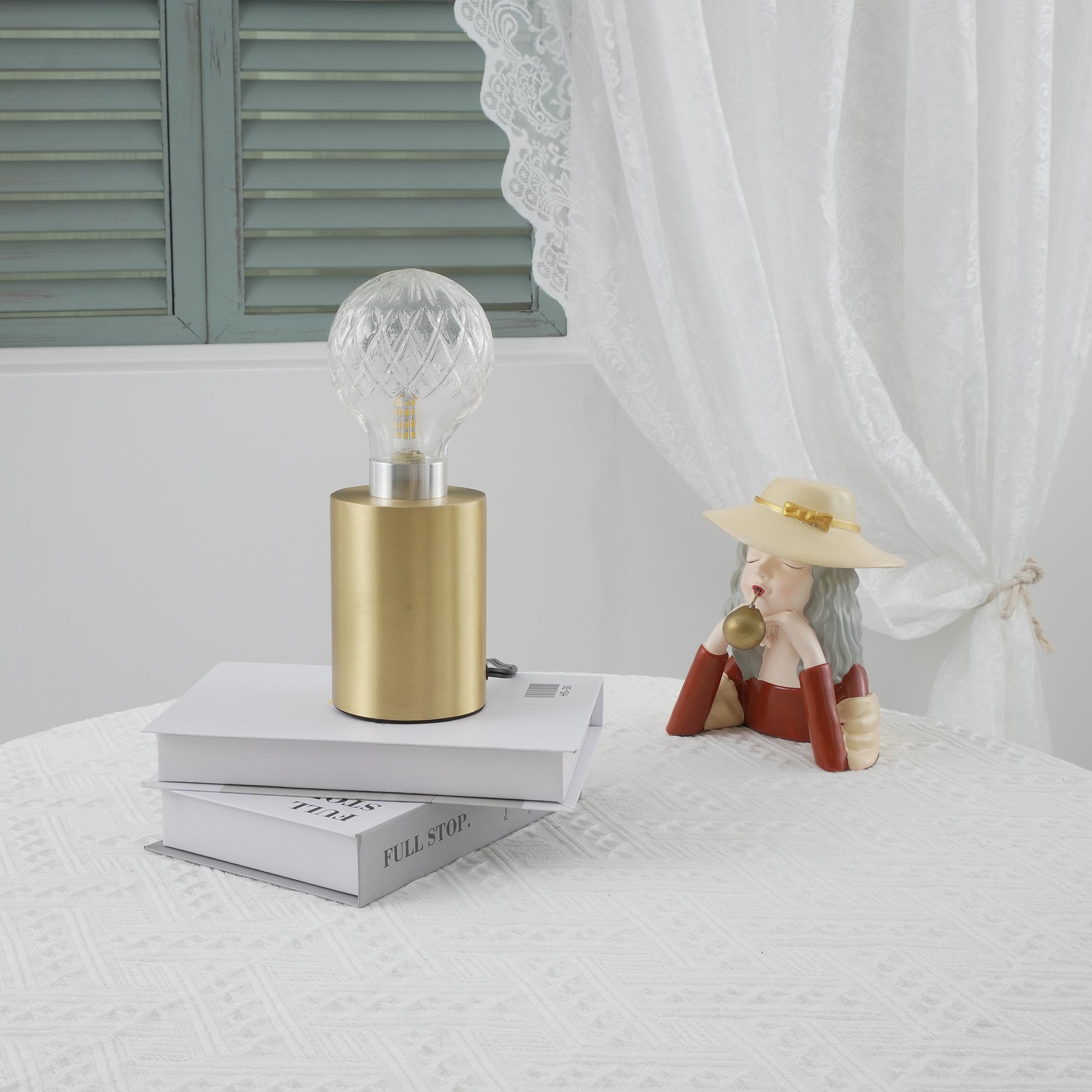 Lámpara de mesa con bombilla de cristal