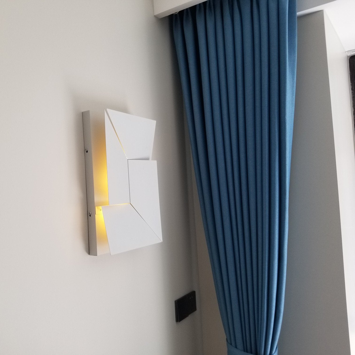 Shadows Grand Sconce.