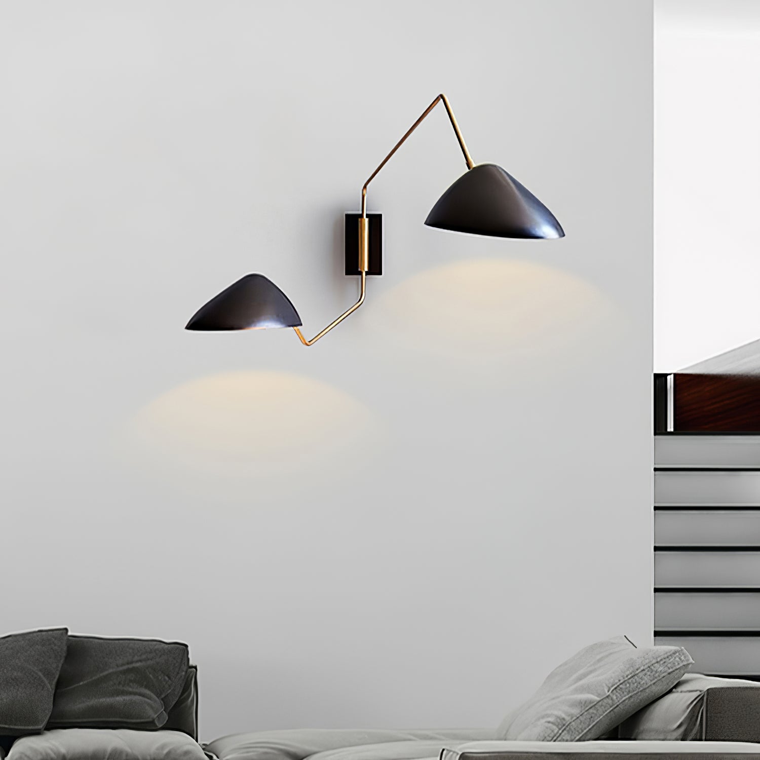 Applique à bras oscillant