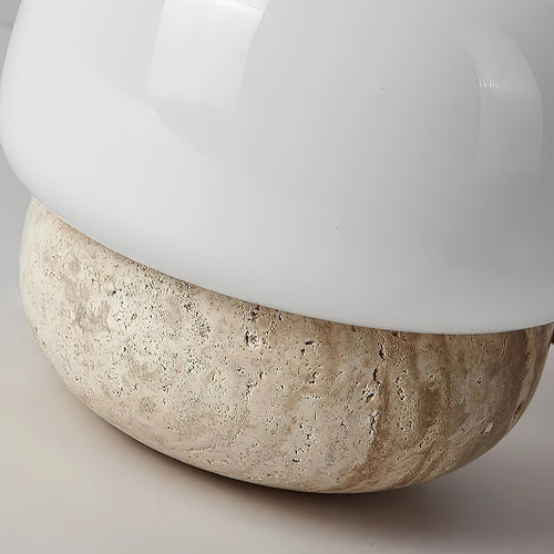 Close-up of the porous travertine base on the Cusco table lamp