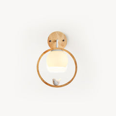 Lámpara de pared con pájaro de madera