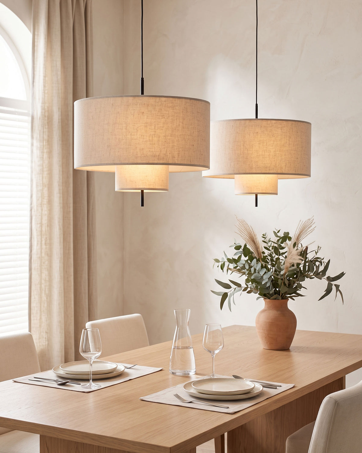 Innegan Linen Pendant Light lit in a room setting