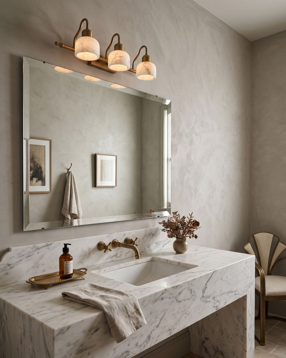 Alabaster vanity light above a bathroom mirror