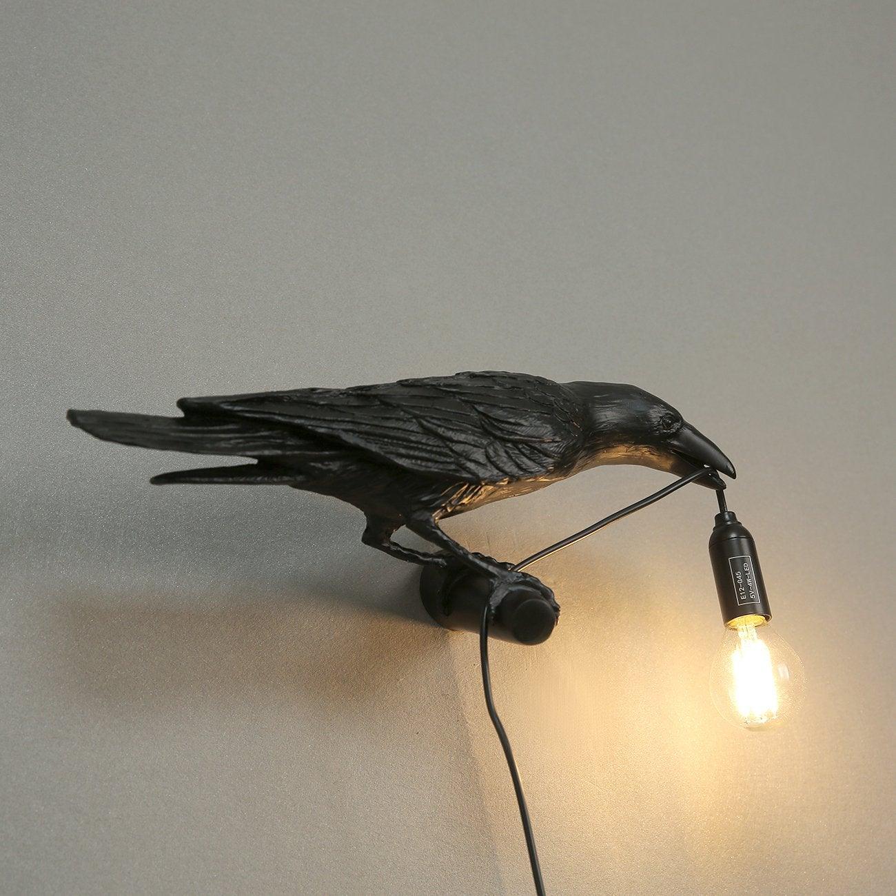 Lámpara de pared de pájaro