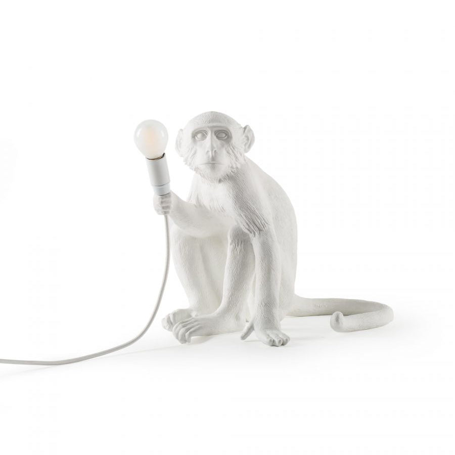 Lámpara de mesa de resina de mono