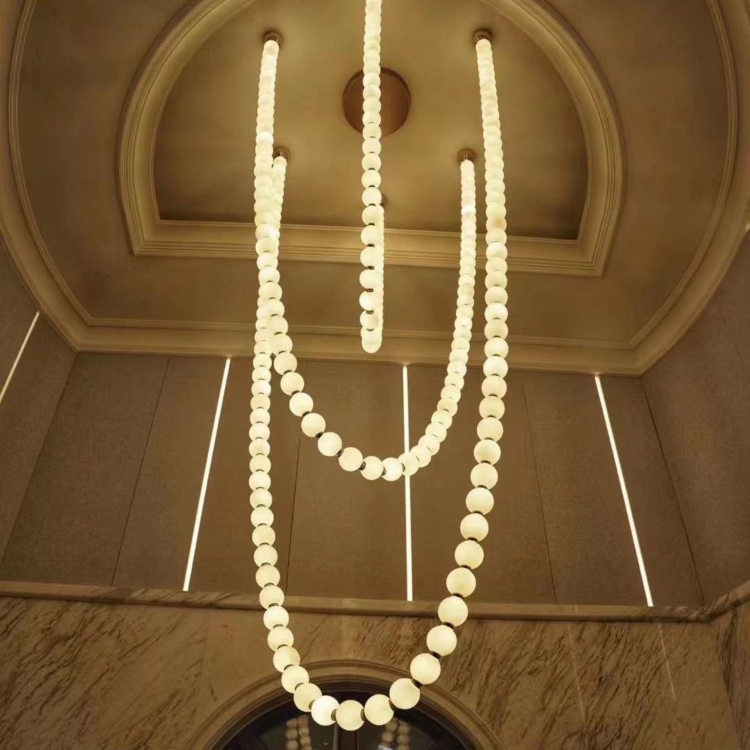 Lustre à collier de perles